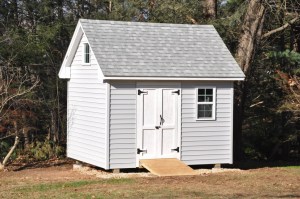 Shed is 10 ft. x 12 ft. It's built on piers that extend below the frost line (42 in. here in CT) and posts to raise the floor framing at least 8 inches above ground for ventilation, reducing the risk of rot. The pier and post system also helped deal with the 16 in. grade drop from front to back of the shed. 